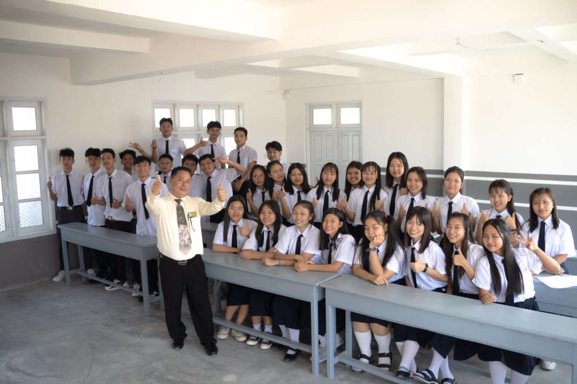 EPS students and their teacher in class